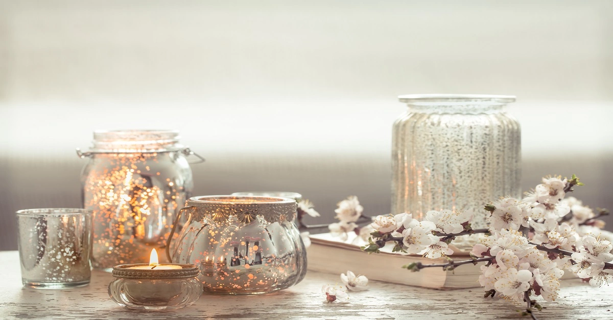 Clean the glass jar, then attach any old lace around it with the help of glue,